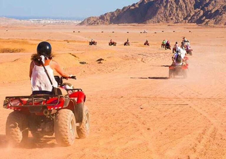 Professional Fun Safari from El Gouna desert tour with quad bikes and mountains.