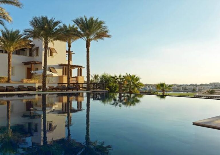 Infinity pool and luxury amenities for trips and spa from Ancient Sands Golf Resort